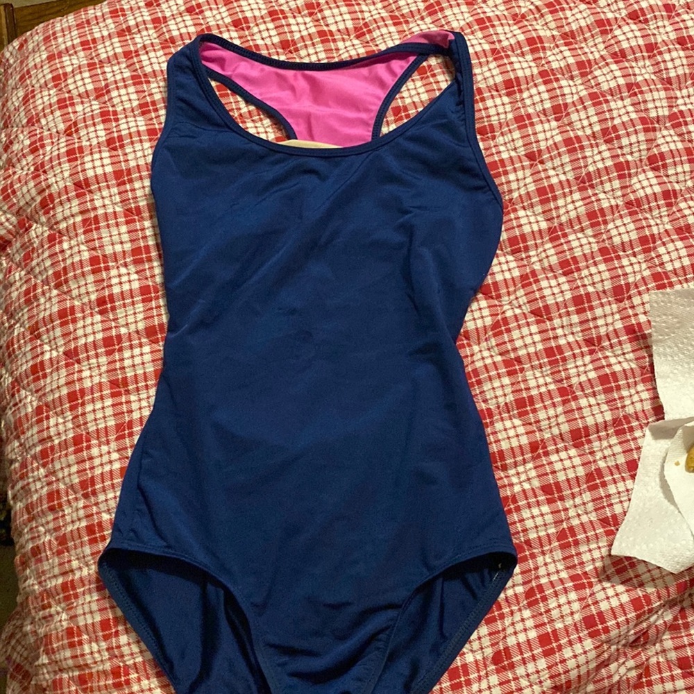 Partial open back leotard.